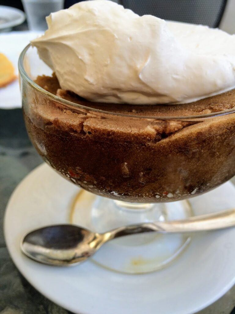 Shaved ice coffee with cream on top - coffee granita in Italy
